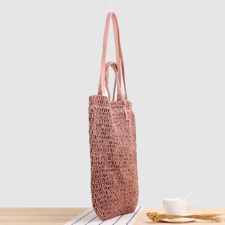 Tragetasche für Damen, ausgehöhlte, tragbare Strandtasche aus Stroh