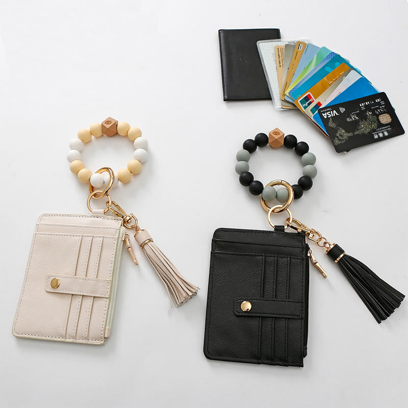 Handgelenktasche mit Silikonperlen und Quaste für Damen