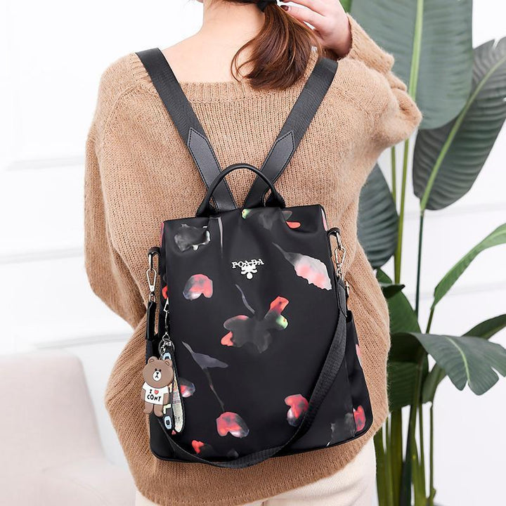 Diebstahlsicherer, wasserdichter Rucksack mit Blumenmuster