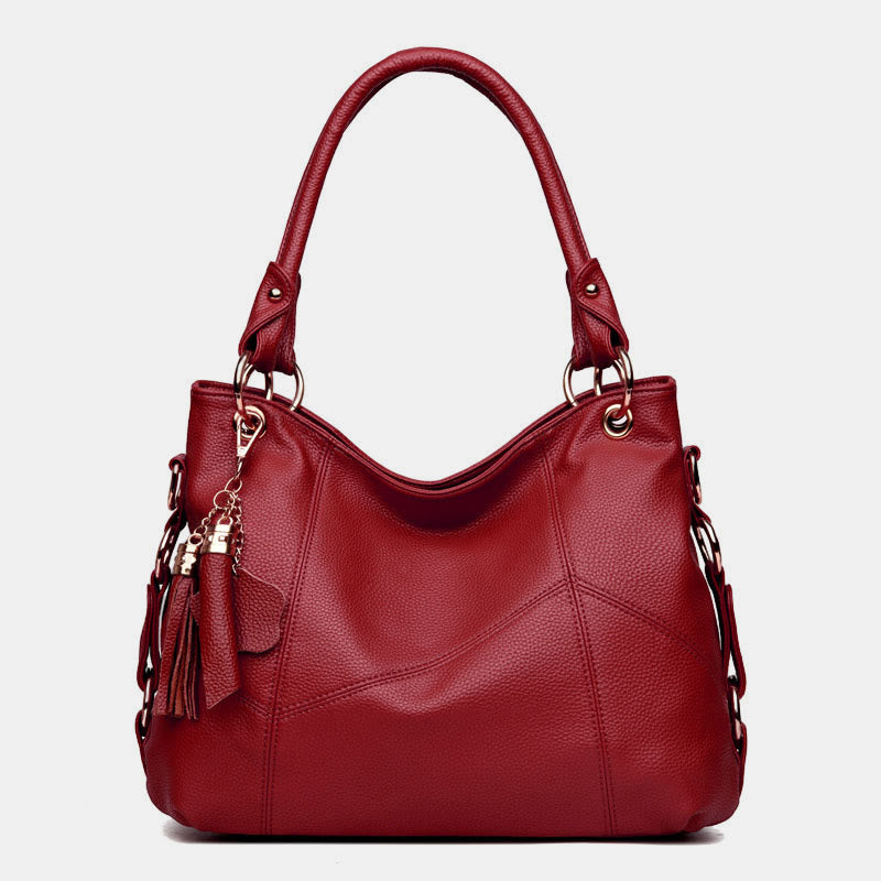 Einfarbige Schultertasche für Damen mit Quastendekor, große Unterarmtasche