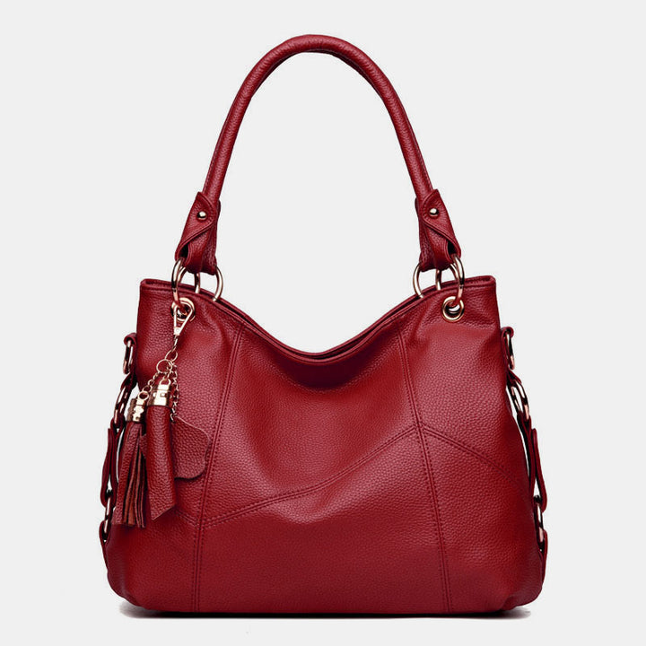 Einfarbige Schultertasche für Damen mit Quastendekor, große Unterarmtasche