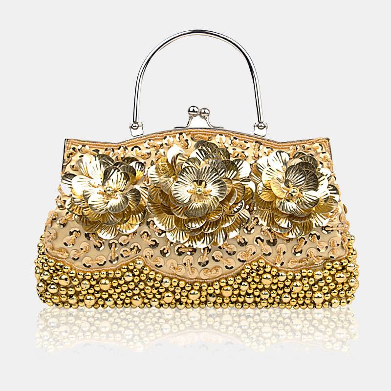 Abendtasche mit Perlen und Pailletten sowie Blumen