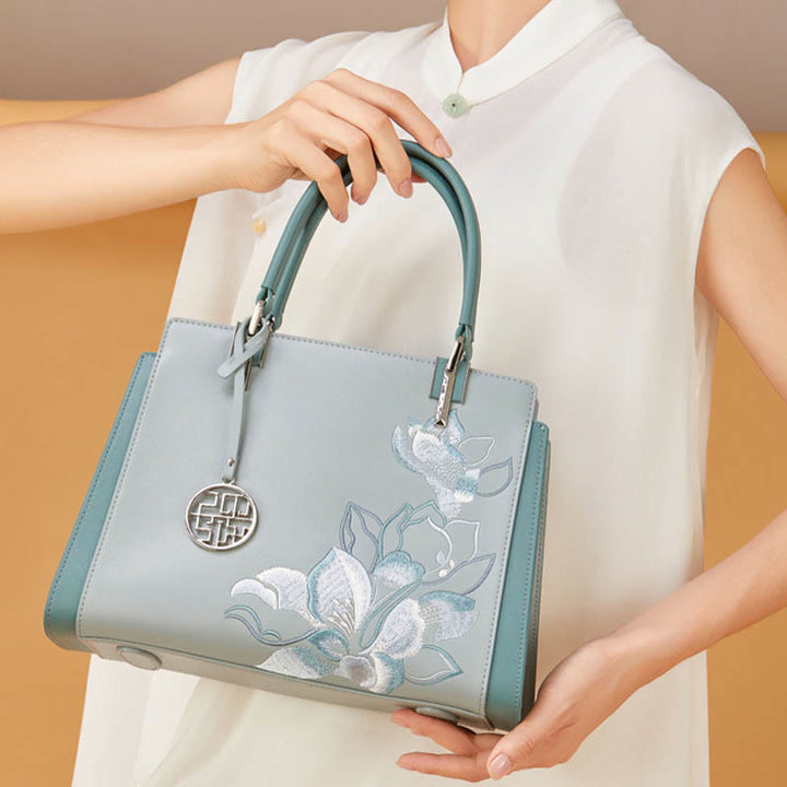 Handtasche aus echtem Leder mit Magnolienblumen-Stickerei