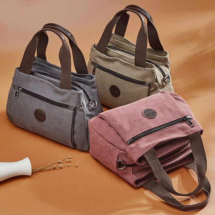Umhängetasche mit großem Fassungsvermögen und mehreren Taschen