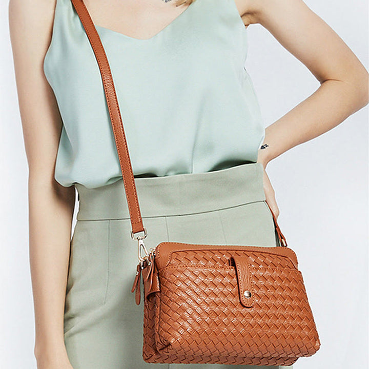 Multifunktionale Unterarmhandtasche für Damen aus gewebtem Leder
