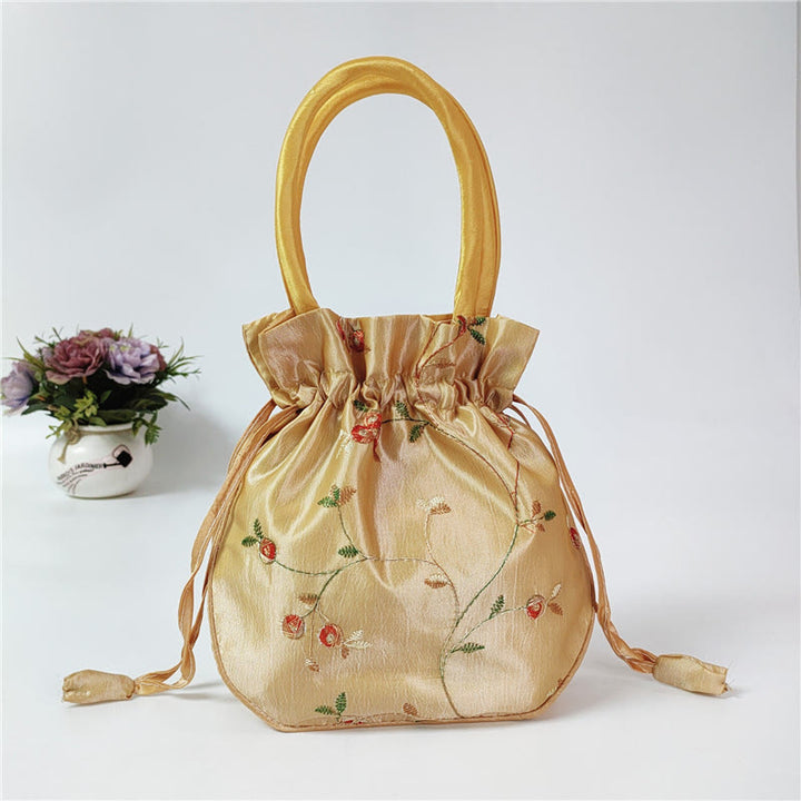 Clutch mit Blumenmuster und Kordelzug, Beuteltasche, Handtasche, Partytasche