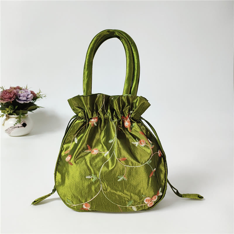 Clutch mit Blumenmuster und Kordelzug, Beuteltasche, Handtasche, Partytasche