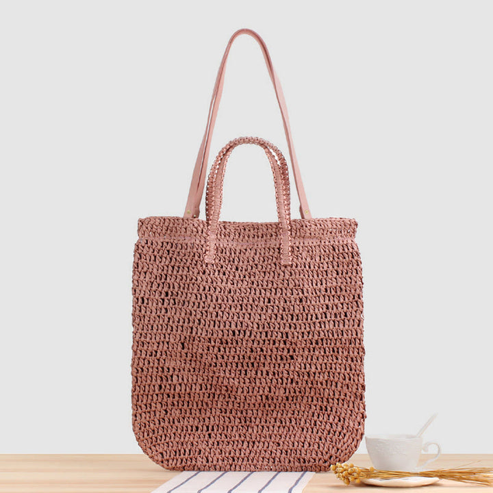 Tragetasche für Damen, ausgehöhlte, tragbare Strandtasche aus Stroh