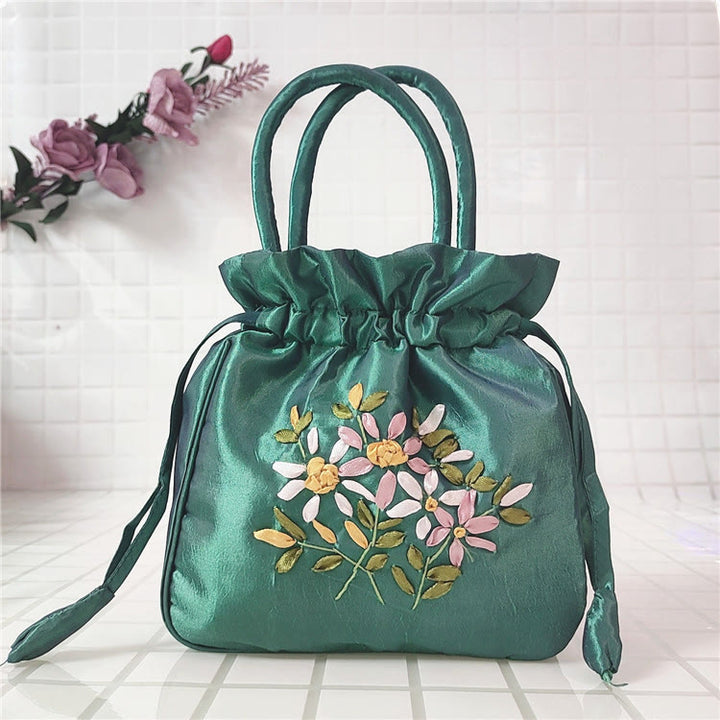 Clutch mit Blumenmuster und Kordelzug, Beuteltasche, Handtasche, Partytasche