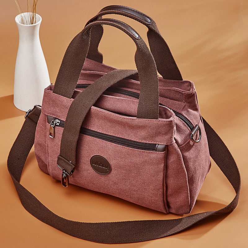 Umhängetasche mit großem Fassungsvermögen und mehreren Taschen