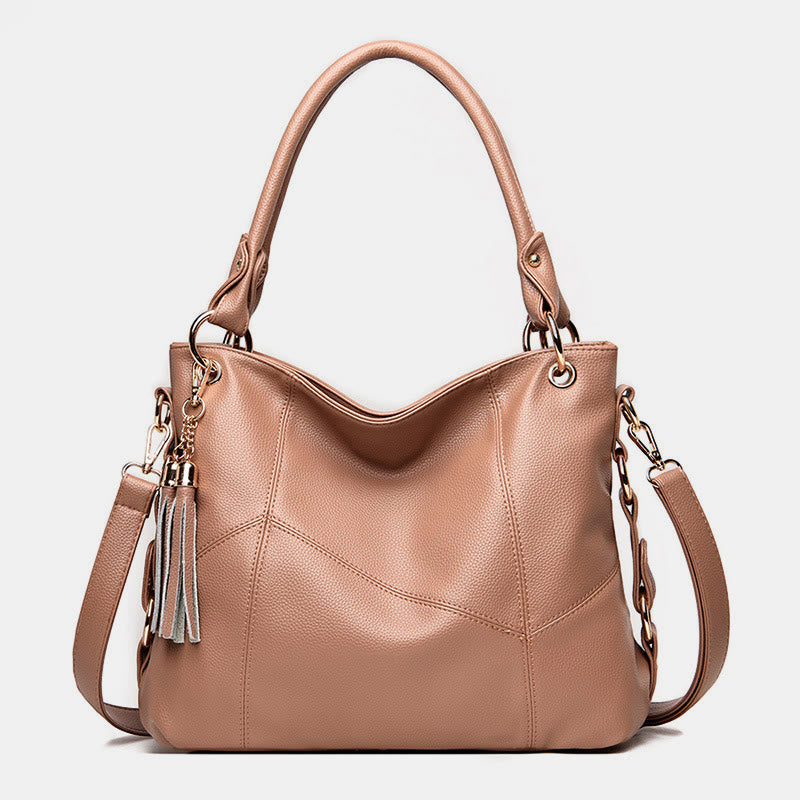 Einfarbige Schultertasche für Damen mit Quastendekor, große Unterarmtasche