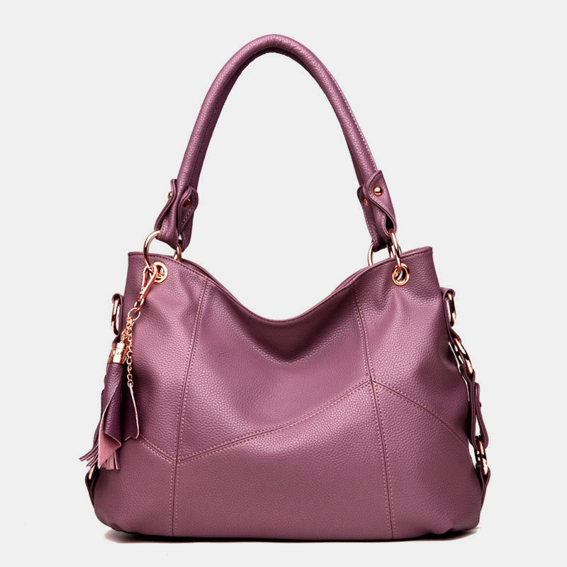 Einfarbige Schultertasche für Damen mit Quastendekor, große Unterarmtasche
