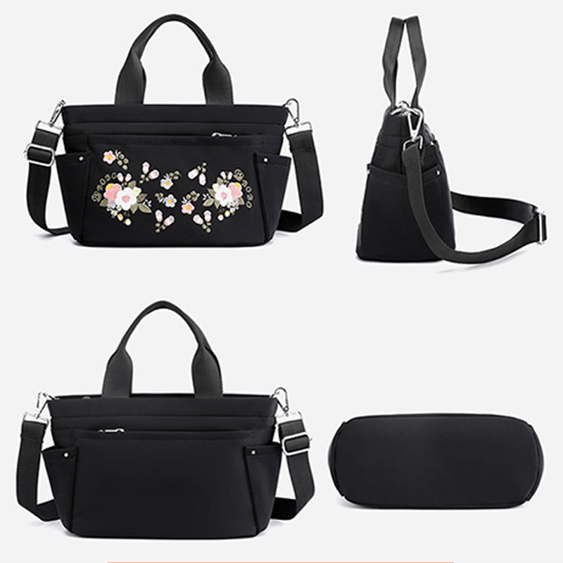 Umhängetasche mit Blumenstickerei und mehreren Taschen