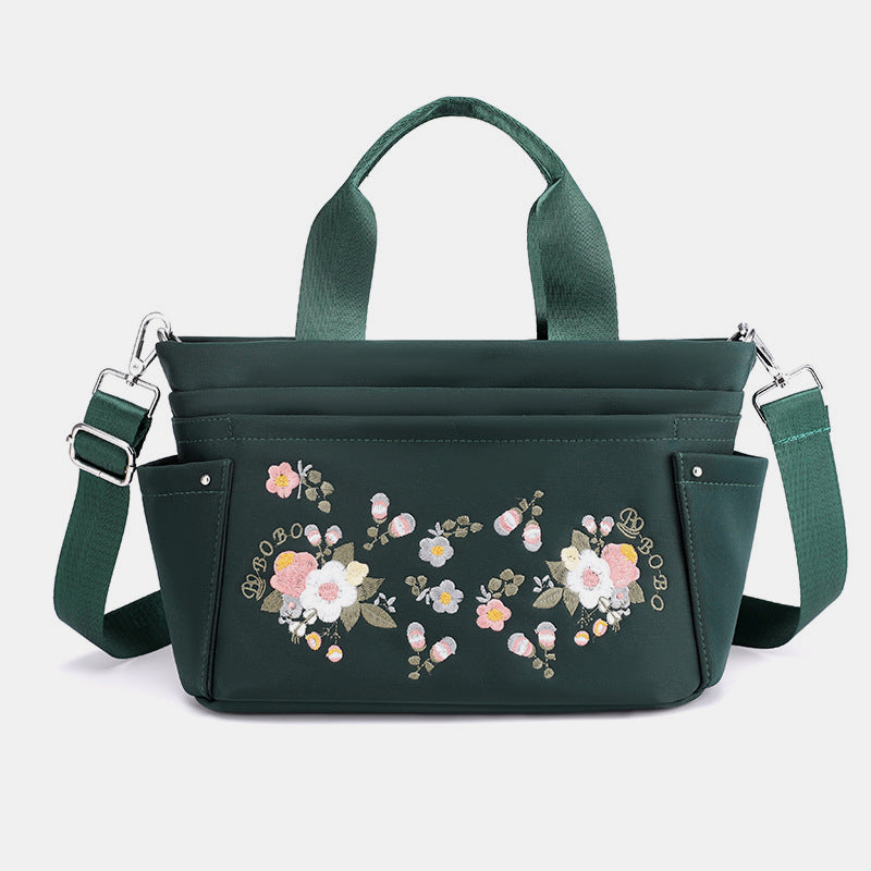 Umhängetasche mit Blumenstickerei und mehreren Taschen