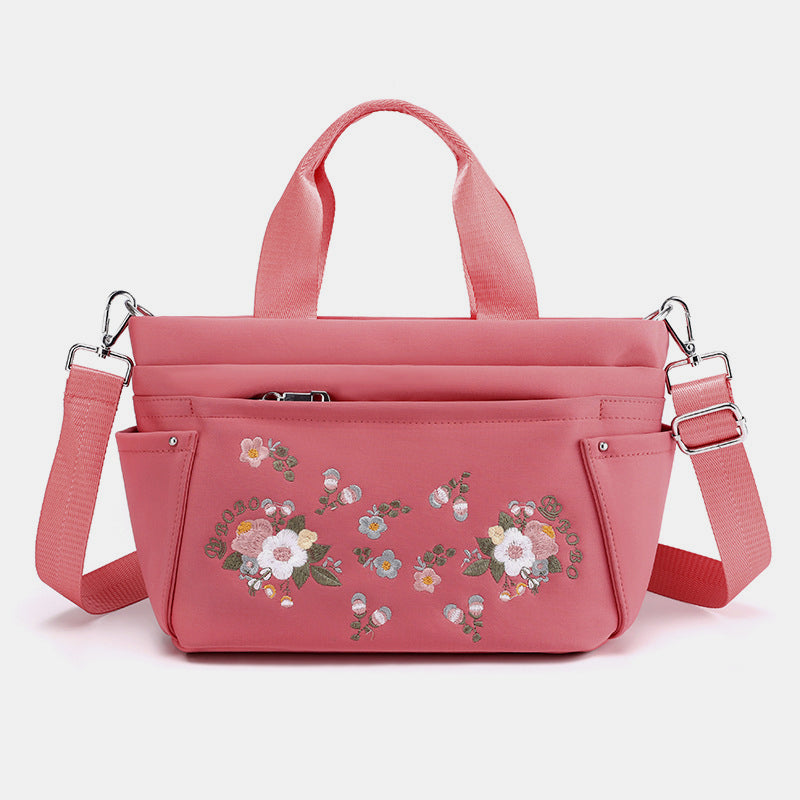 Umhängetasche mit Blumenstickerei und mehreren Taschen