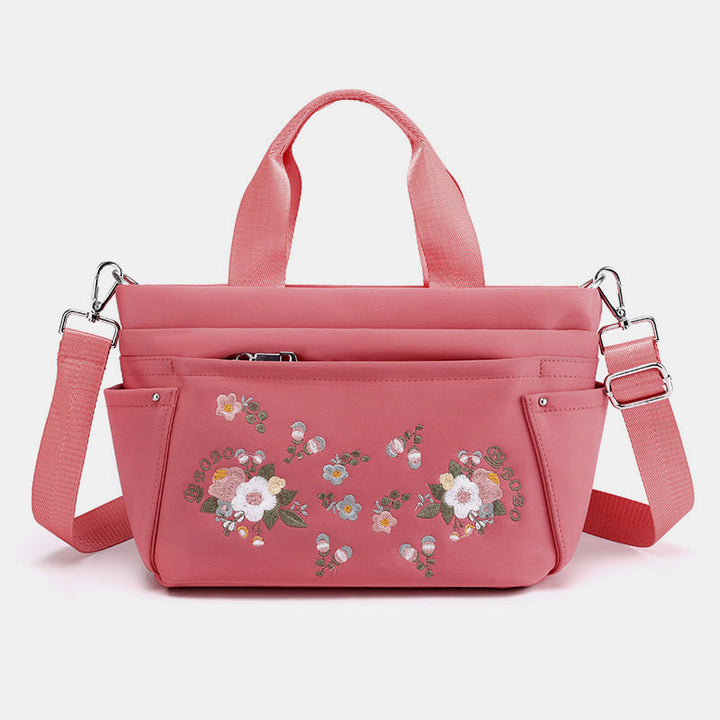 Umhängetasche mit Blumenstickerei und mehreren Taschen