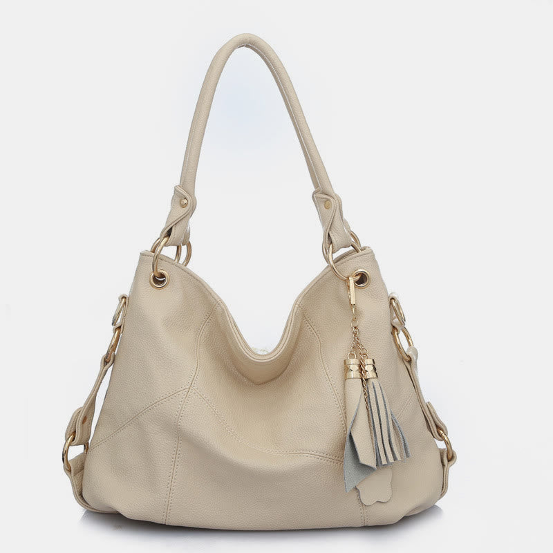 Einfarbige Schultertasche für Damen mit Quastendekor, große Unterarmtasche