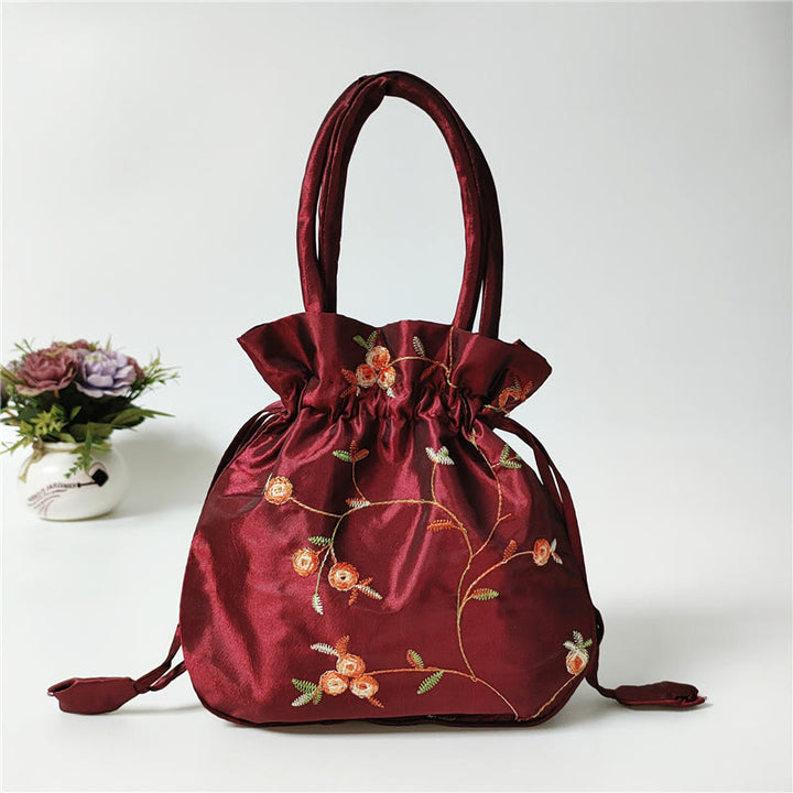 Clutch mit Blumenmuster und Kordelzug, Beuteltasche, Handtasche, Partytasche