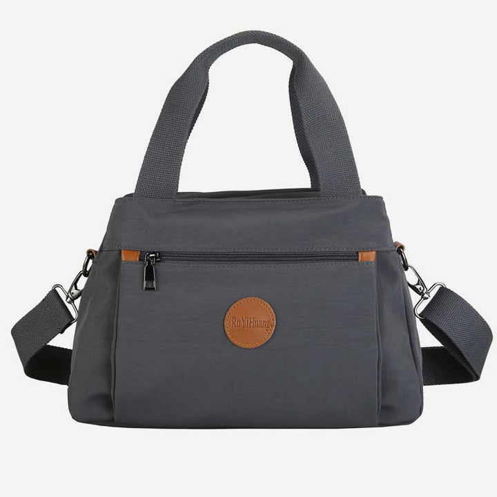 Umhängetasche mit großem Fassungsvermögen und mehreren Taschen