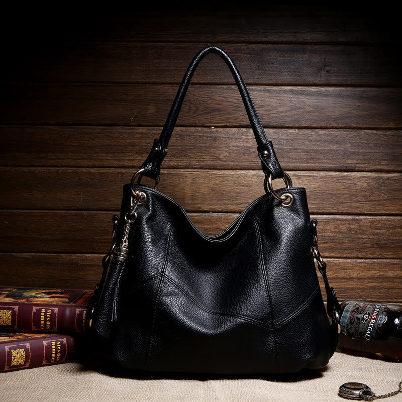 Einfarbige Schultertasche für Damen mit Quastendekor, große Unterarmtasche