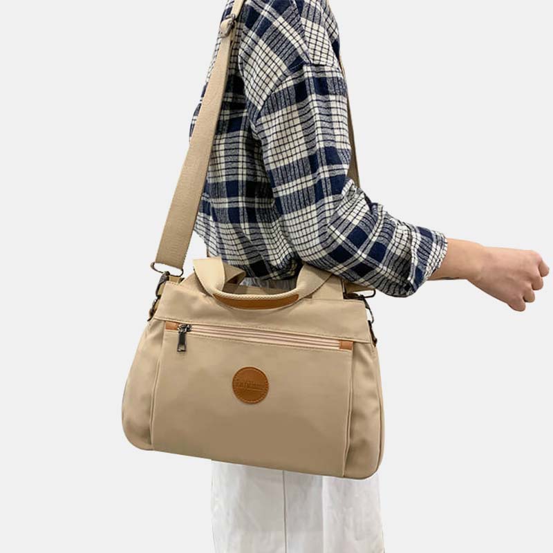 Umhängetasche mit großem Fassungsvermögen und mehreren Taschen