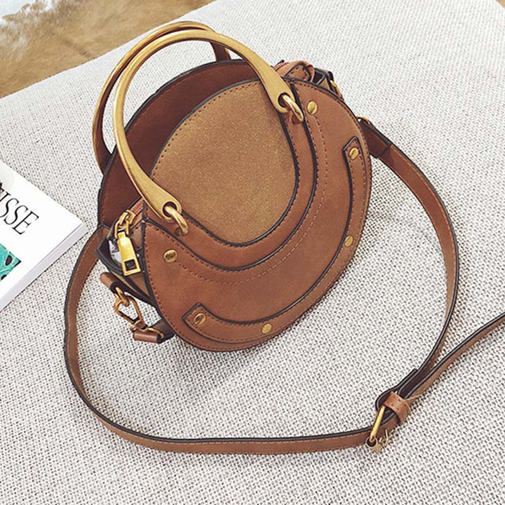 Elegante, runde Top-Grifftasche mit großem Fassungsvermögen und metallischem Griff