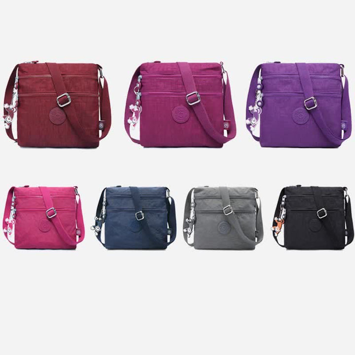 Leichte kleine Crossbody-Tasche mit Dreifach-Reißverschluss, Schultertasche für Damen