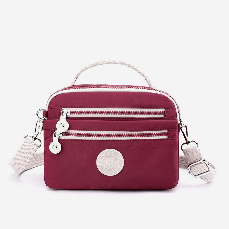 Leichte Handtasche aus Nylon mit mehreren Taschen, kleine Umhängetasche