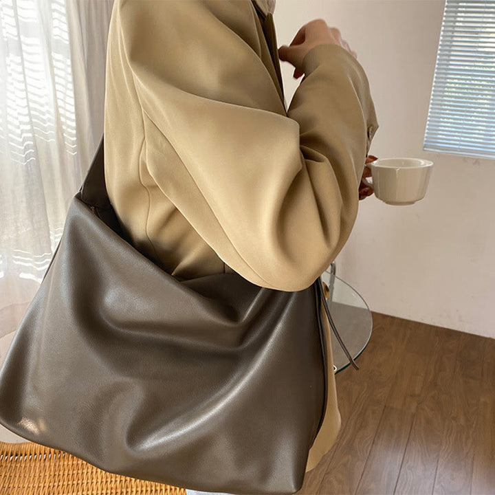 Damen Handtasche aus weichem Leder mit breiten Riemen, Vintage-Umhängetasche