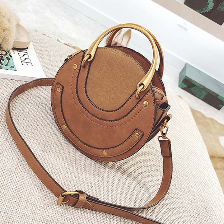 Elegante, runde Top-Grifftasche mit großem Fassungsvermögen und metallischem Griff