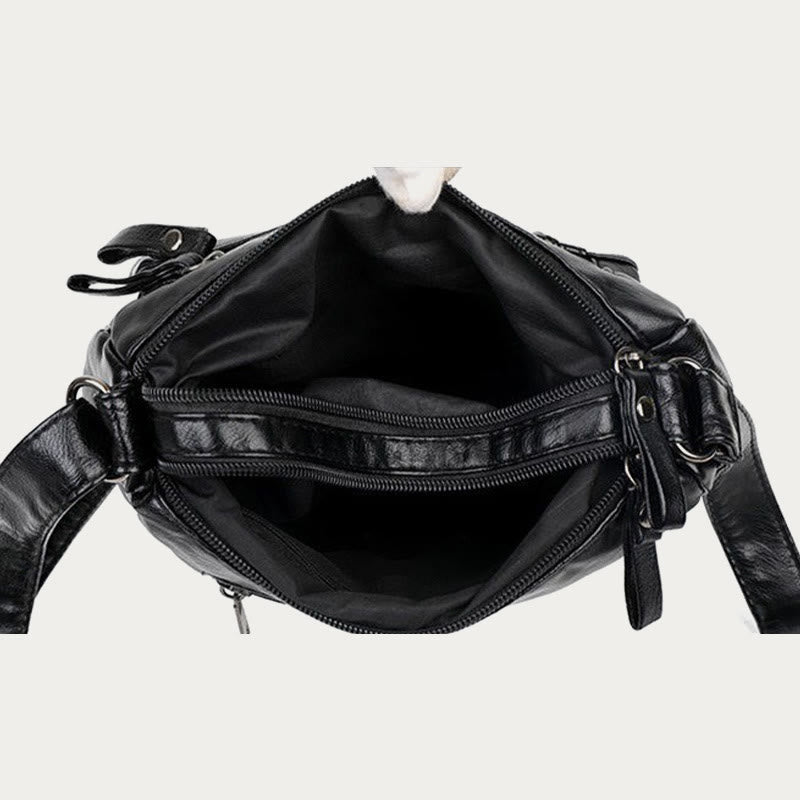 Minimalistische Tragetasche aus weichem Leder mit breitem Schultergurt