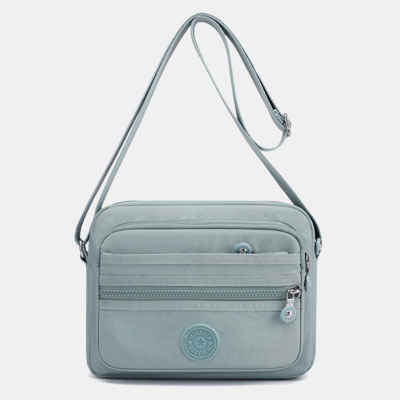 Lässige Umhängetasche mit mehreren Taschen und leichtem Design