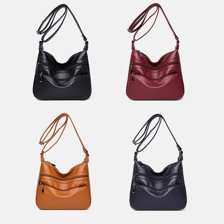 Weiche Umhängetasche mit großem Fassungsvermögen und mehreren Taschen und zwei Fächern
