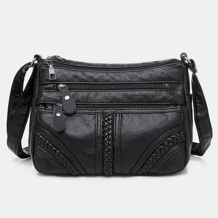 Einfarbige Umhängetasche mit mehreren Taschen