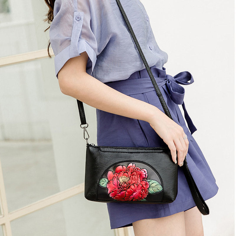Elegante Umhängetasche für Damen, halbrund, mit Blumenprägung