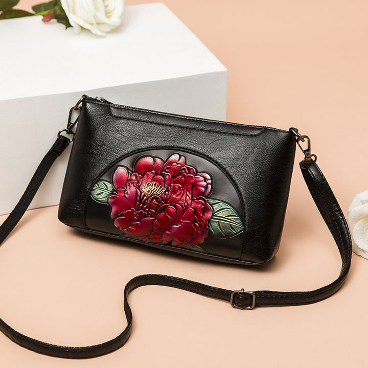 Elegante Umhängetasche für Damen, halbrund, mit Blumenprägung