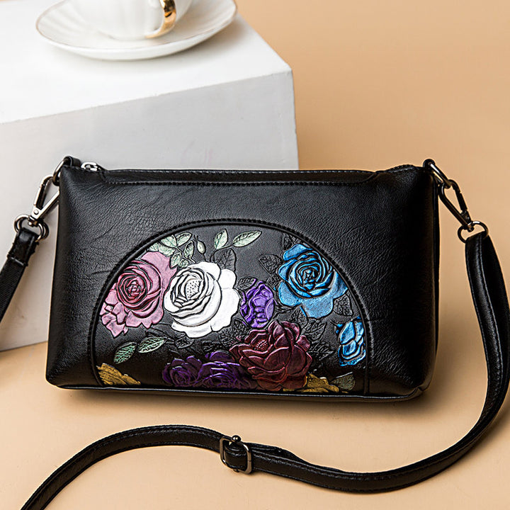 Elegante Umhängetasche für Damen, halbrund, mit Blumenprägung