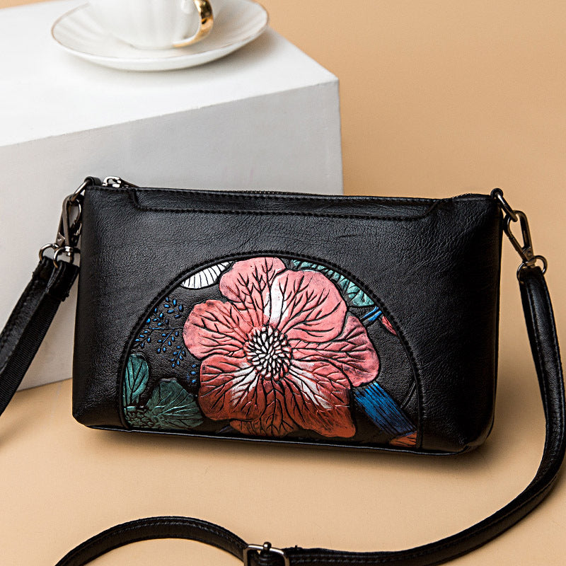 Elegante Umhängetasche für Damen, halbrund, mit Blumenprägung