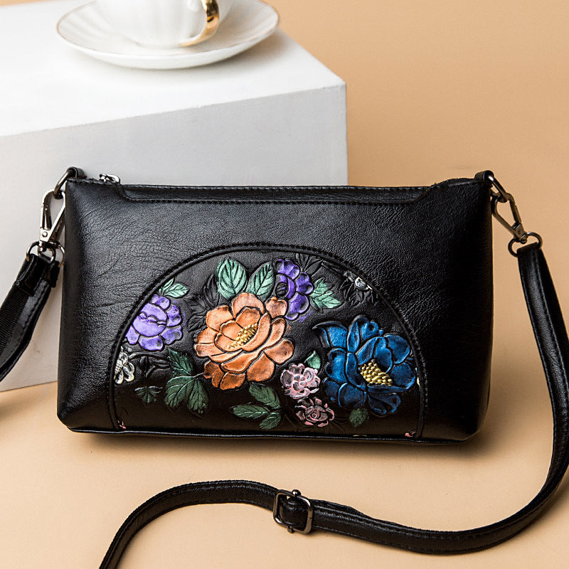 Elegante Umhängetasche für Damen, halbrund, mit Blumenprägung