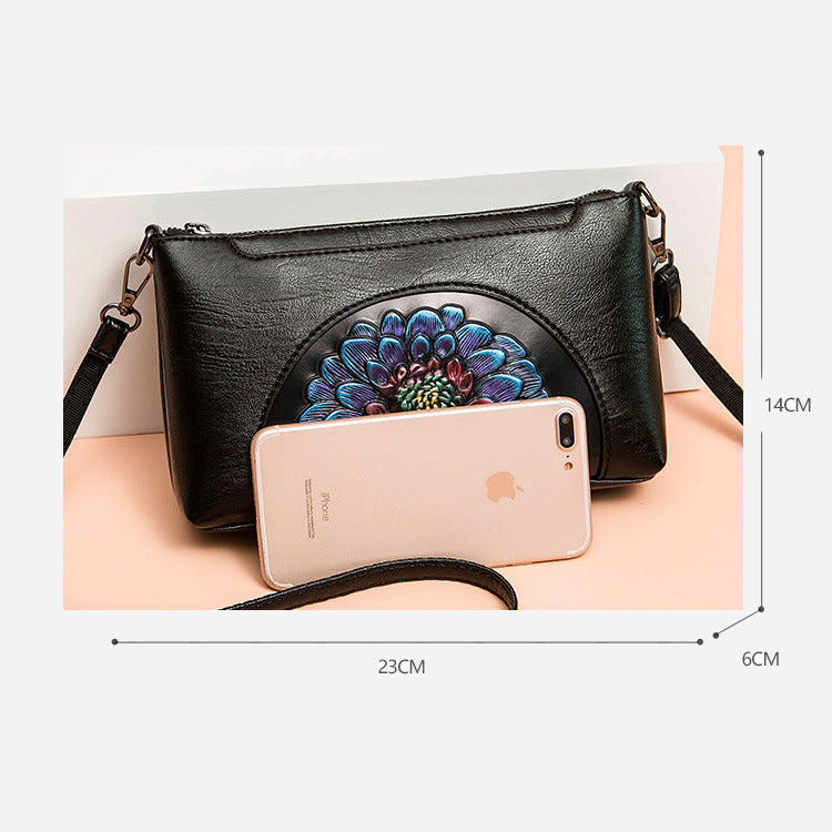 Elegante Umhängetasche für Damen, halbrund, mit Blumenprägung