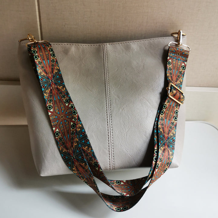 Retro-Umhängetasche für Damen mit breiten Riemen, raffinierte Tragetasche