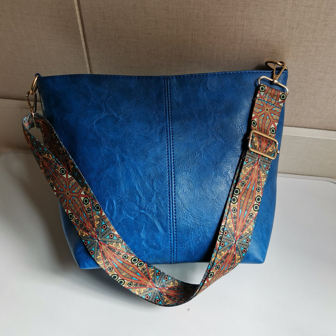 Retro-Umhängetasche für Damen mit breiten Riemen, raffinierte Tragetasche