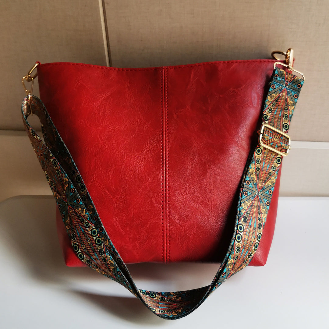 Retro-Umhängetasche für Damen mit breiten Riemen, raffinierte Tragetasche