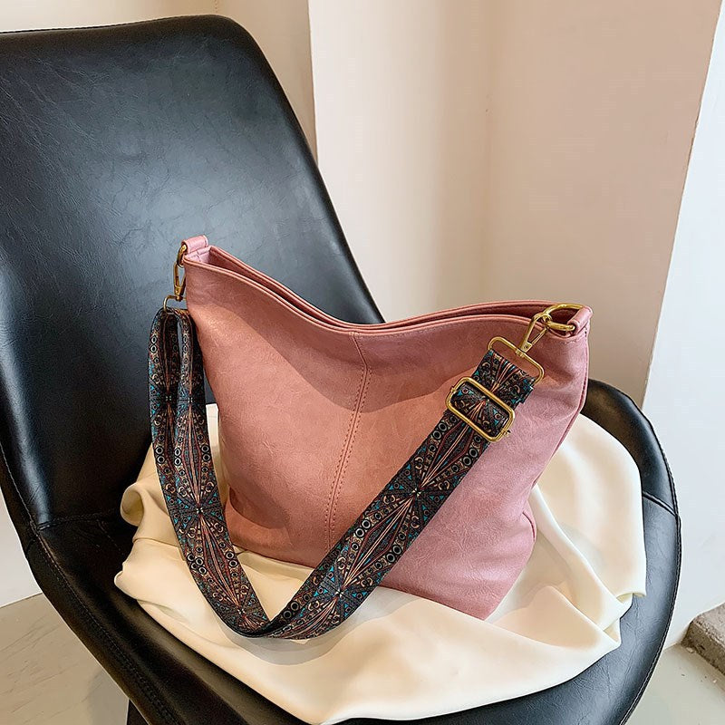 Retro-Umhängetasche für Damen mit breiten Riemen, raffinierte Tragetasche