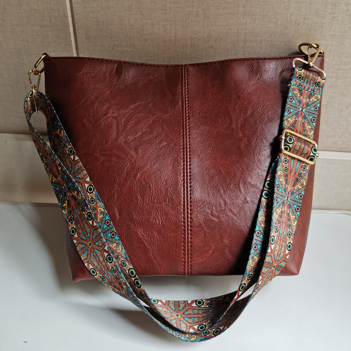 Retro-Umhängetasche für Damen mit breiten Riemen, raffinierte Tragetasche