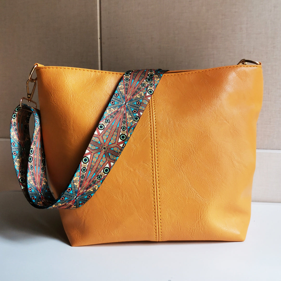 Retro-Umhängetasche für Damen mit breiten Riemen, raffinierte Tragetasche