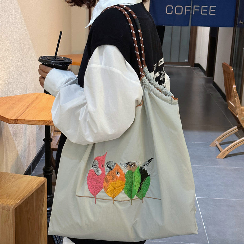 Handtasche mit süßer Vogelstickerei, strapazierfähige Umhängetasche mit Kordelzug für Damen
