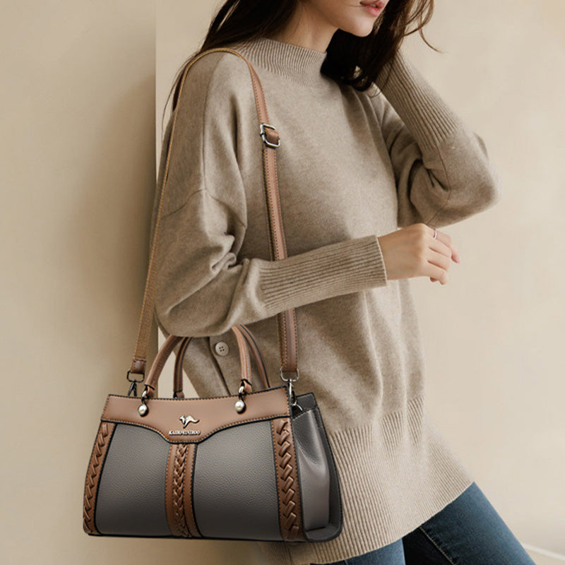 Horizontale Tasche mit Henkel oben und Twist-Streifen, süße Umhängetasche