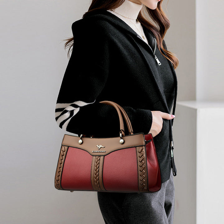Horizontale Tasche mit Henkel oben und Twist-Streifen, süße Umhängetasche
