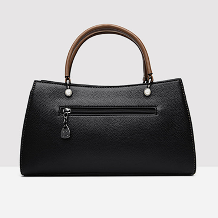 Horizontale Tasche mit Henkel oben und Twist-Streifen, süße Umhängetasche